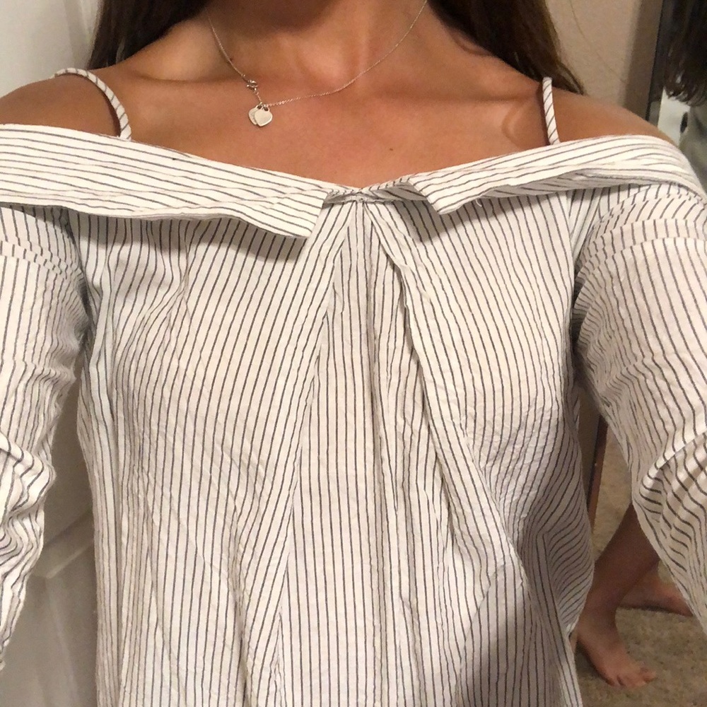 Mel Rose and market off the shoulder shirt